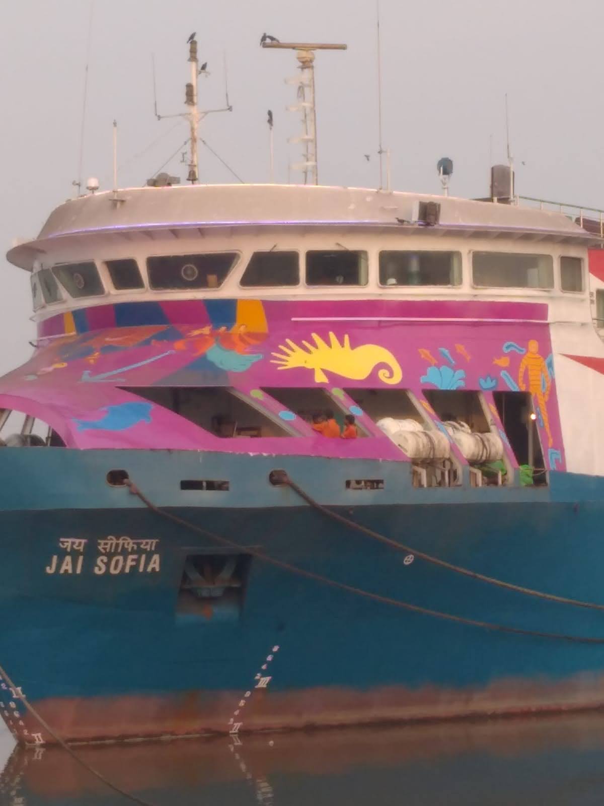 Custom hull artwork painted on a vessel's superstructure